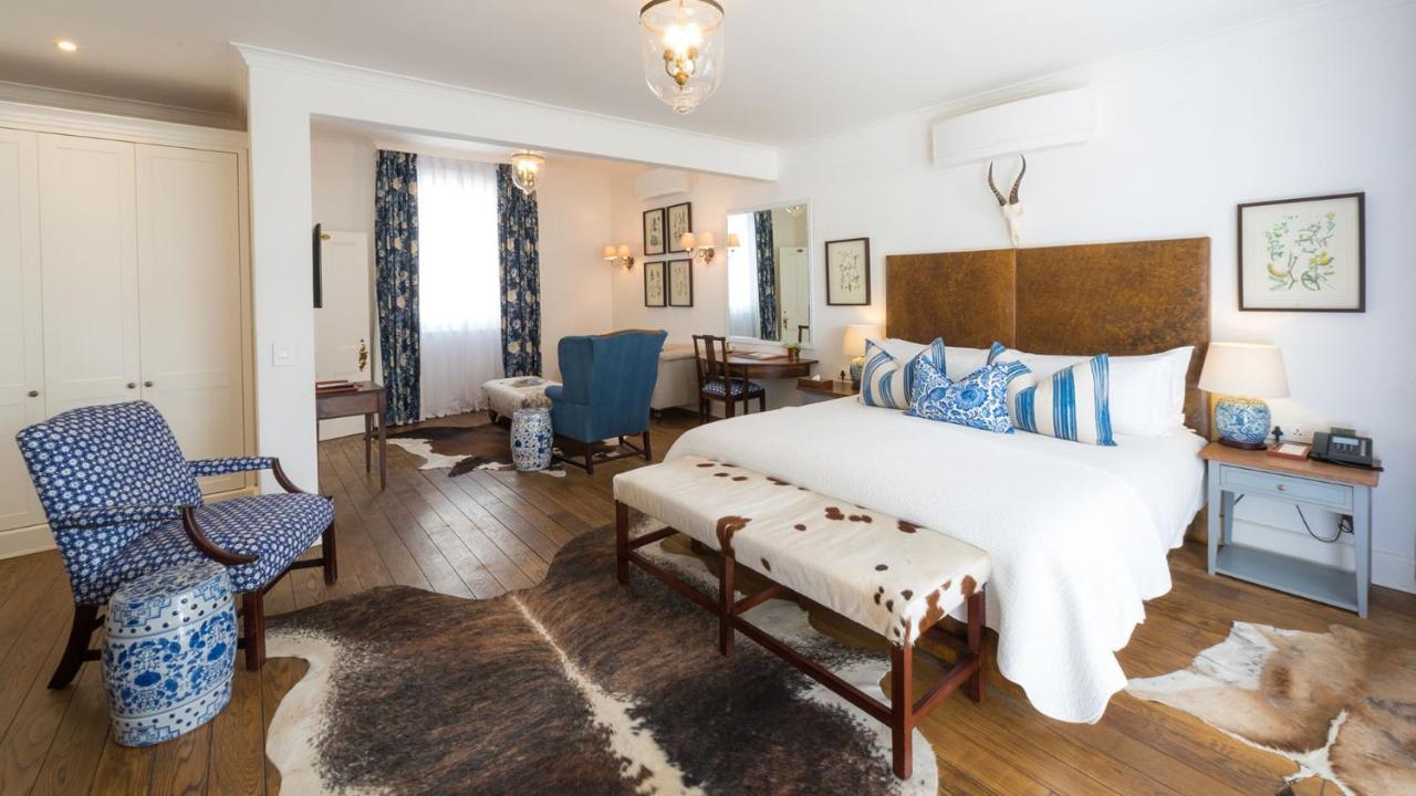 Drostdy Hotel Graaff-Reinet Екстериор снимка A bedroom at the Cape Heritage
